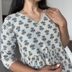 Elegant Beige Floral Printed Peplum Top – Chic Everyday Style